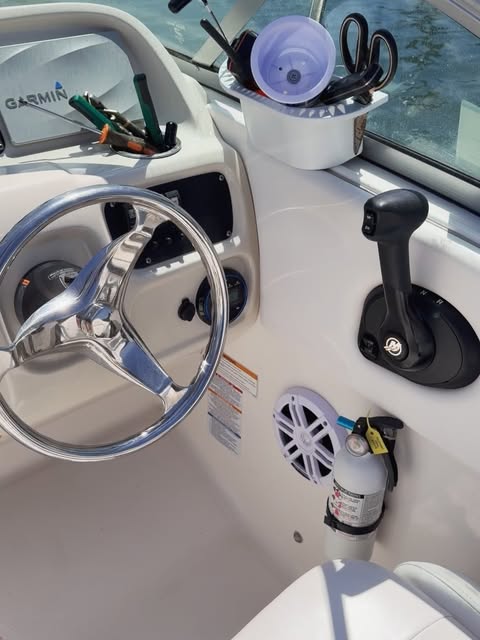 Boat helm with marine speaker