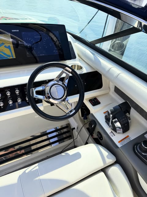 Helm with wheel and throttle