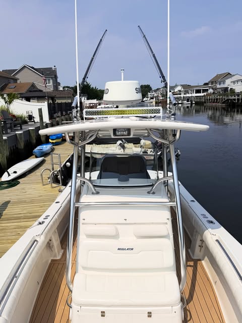 Center console with T-top and LED light bar at the dock