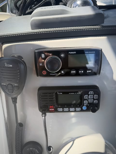 Fusion stereo and VHF radio installed at the helm
