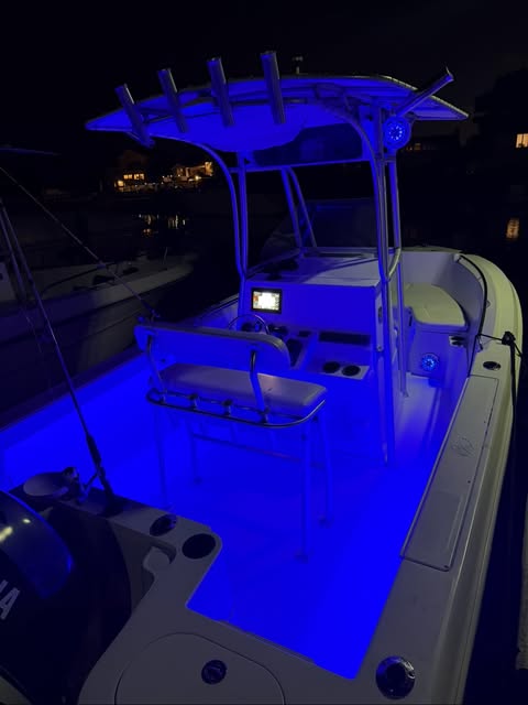 Center console lit in blue RGB lighting at night
